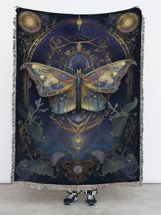 a large tapestry with a butterfly on it