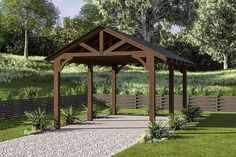 a wooden gazebo sitting on top of a lush green field