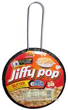 a frying pan with a handle on it that says jiffy pop butter popcorn