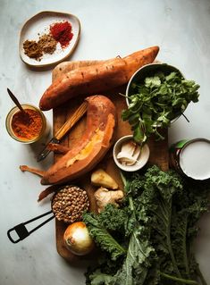 various vegetables and spices on a cutting board