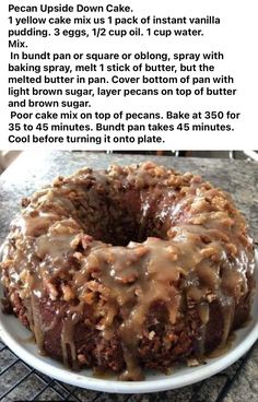 a cake with icing sitting on top of a white plate