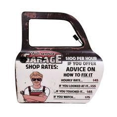 an old, rusted metal storage box with the words garage shop rate on it