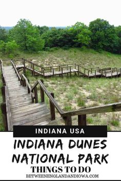 the indiana dunes national park sign is shown in front of a grassy area with stairs