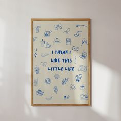 there is a framed poster that says i think it like this little life on the wall