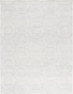 a white rug with an intricate design on it