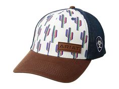 Ariat Multi Cactus Snapback Cap - Caps : White/Blue : The eye-catching Southwestern design of the Ariat Multi Cactus Snapback Cap lets you show off a little desert style. Comfortable baseball cap with fabric front and mesh back. Features a white background with multi-colored cactus and faux leather patch with an Ariat name logo on the front panel. Six-panel baseball cap design. Snapback closure for adjustable fit. Spot clean only. 100% man-made materials. Imported. Measurements: Circumference: 2 Ariat Hats, Southwestern Fashion, Country Clothes, Country Hats, Ninth Grade, Desert Fashion, Cap White, Cap Designs, Western Hats