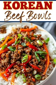 this korean beef bowl is loaded with rice, carrots and green onions it's ready to be eaten