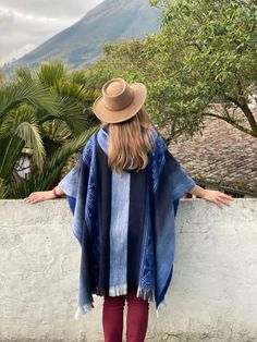 This poncho is made of baby alpaca yarn, one of the finest yarns in the world. It is lightweight, but warm and very soft and won't itch. Colours and patterns might differ slightly from the photo shown as of handmade nature of each item. One size fits most: 45" W x 35" H +2" fringe (116 cm W x 90 cm H + 5 cm fringe) Approx. Weight: 1.5 lbs Materials: Baby Alpaca Wool blend An alpaca (Vicugna pacos) is a domesticated species of South American camelid. It resembles a small llama in appearance.Alpac One Size Bohemian Alpaca Poncho, Bohemian Alpaca Wrap One Size, Bohemian Alpaca Wraps One Size, Handwoven Alpaca Poncho For Fall, Artisan Alpaca Poncho For Fall, Fall Handwoven Alpaca Poncho, One Size Alpaca Shawl Outerwear, Alpaca Shawl Outerwear, Blue Cozy Poncho One Size