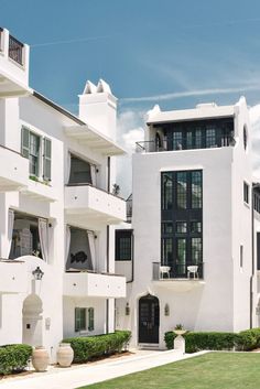 an apartment building with many balconies and windows