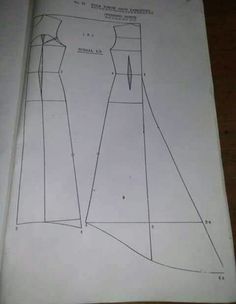 an open book with a drawing of a dress on top of the page, showing how to sew