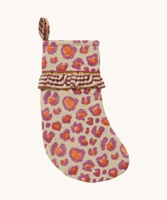 a pink and orange stocking with an animal print