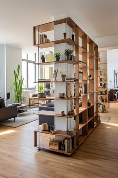 a living room filled with furniture and bookshelves