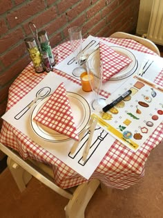 a table set with place settings and napkins