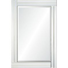 a white framed mirror on a wall