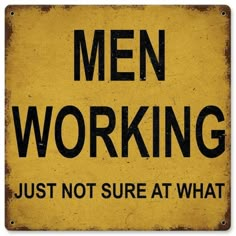 a yellow sign that says men working just not sure at what