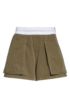 A branded elastic waistband features in tucked-in or cropped-top pairings with these cargo-influenced rave shorts cut from peached cotton twill. 3" inseam; 27" leg opening; 11" front rise; 16" back rise (size 2) Side zip closure Cargo bellows pockets; back flap pockets 100% cotton with 64% nylon, 22% polyester, 14% elastane waistband Dry clean Imported Designer Clothing