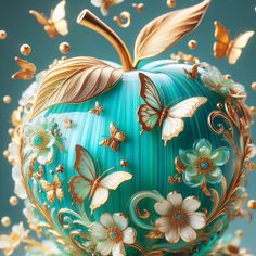 a blue apple with gold butterflies and flowers on it's side, surrounded by bubbles