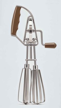 an image of a kitchen utensils set up in the shape of a bike