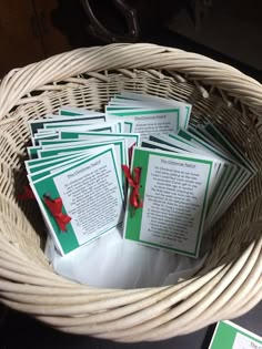 some cards are sitting in a basket on the table