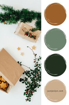 a box filled with cookies next to christmas tree branches and other holiday decorating items