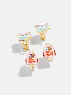 Earn some major style points with the Hit The Books Kids' Clip-On Earring Set. Make studying fun with our Hit The Books Kids’ Clip-On Earring Set! This set comes with one pair of colorful pencil earrings and one pair of playful notebook earrings, perfect for back to school styling. Easily clip them on and get ready to ace your fashion game. Please note: intended for children 3+. Make Studying Fun, Pencil Earrings, Kids School Supplies, Book Earrings, One Set, Fashion Games, Colored Pencils, Clip On Earrings, Earring Set