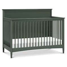 a green crib with white sheets on the bottom and side rails, against a white background