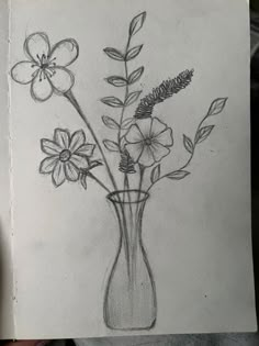 a pencil drawing of flowers in a vase