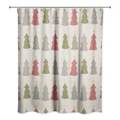 a shower curtain with christmas trees on it