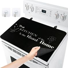 the kitchen is in the heart of the home with this oven cover and burner