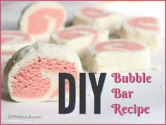 some pink and white marshmallows with the words diy on it in front of them