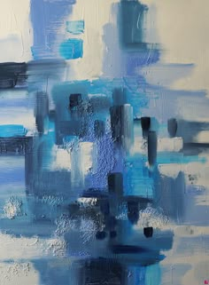 an abstract painting with blue and white colors