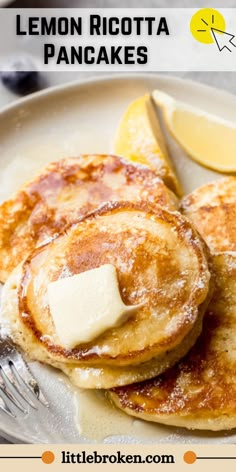 lemon ricotta pancakes on a plate with butter and syrup