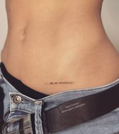 a woman's stomach with an inscription on it