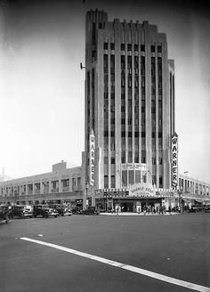 an old black and white photo of a large building