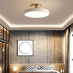 a modern bedroom with wood paneling and lighting