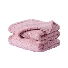 three pink towels stacked on top of each other