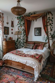 a bed sitting in the middle of a bedroom next to a window with curtains on it