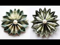 two origami flowers made out of money are shown in three different positions, one is white and the other is green