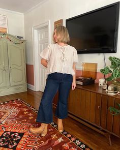 the internets favorite #gannidupe is back !! plus a haircut !!! this is the #antheablouse hacked into a ganni style tie front top made from the cutest freaking gingham, obvi styled with my #worshipjeans & my brand new (much needed) @birdofflightshoes Ojai boots🤌🏻🤌🏻 . . . #handmadewardrobe #sewing #sewistsofinstagram #thanksimadeit #memade #memadewardrobe #sewistootd Ganni Top Outfit, Front Tie Top Outfit, Ganni Style, Tie Front Top Outfit, Art Teacher Outfits, Urban Cowgirl, A Haircut, Handmade Wardrobe