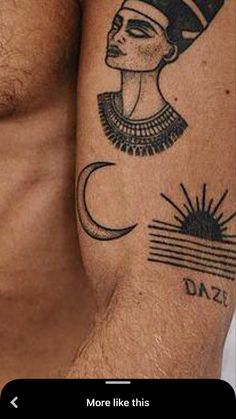 a man with tattoos on his arm and chest is wearing an egyptian headdress