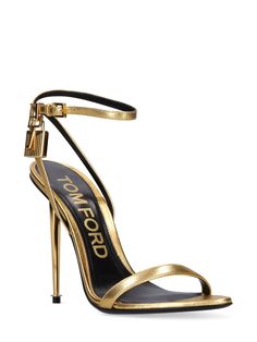 105mm Metal heel. Metallic leather upper. Adjustable ankle strap with buckle closure. Gold-colored metal padlock detail. Pointed toe. Leather insole. Leather sole Tom Ford Gold Heels, Gold Tom Ford Heels, Serafina Falcone, Tom Ford Heels, Leather Toms, Tom Ford Shoes, Latest Sandal, Metallic Sandals, Brown Leather Sandals