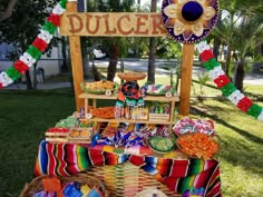 a table filled with lots of food and decorations