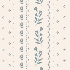 a white and blue wallpaper with small flowers on the left side of the wall