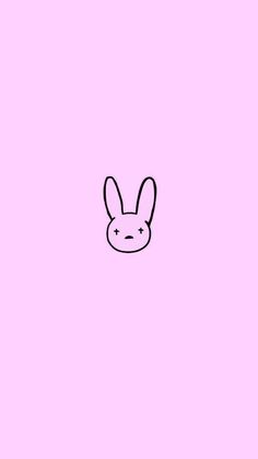 a pink background with a bunny face drawn on it