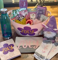 a basket filled with lots of items on top of a table