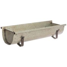 an old metal trough is shown on a white background