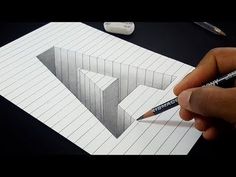 someone is drawing an image with pencils on top of a piece of lined paper