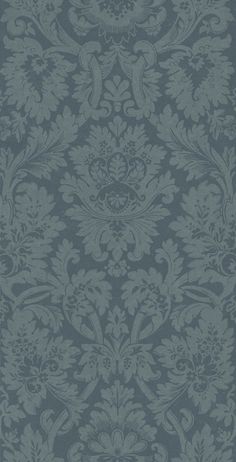 a blue and grey wallpaper with an ornate design on the bottom half of it