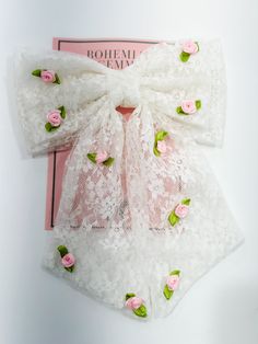 In our bow era!! So why not continue the era into the hair accessories!! The bow clips will make any day a good hair day! Sweet and feminine. The floral lace one is an off white lace material dressed with roses. The bow is light weight and measures 5x7". Lace Hair Bow, Good Hair, Lace Material, Lace Hair, Good Hair Day, Bow Clips, Hair Day, Floral Lace, White Lace