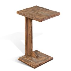 a small wooden table with one leg raised